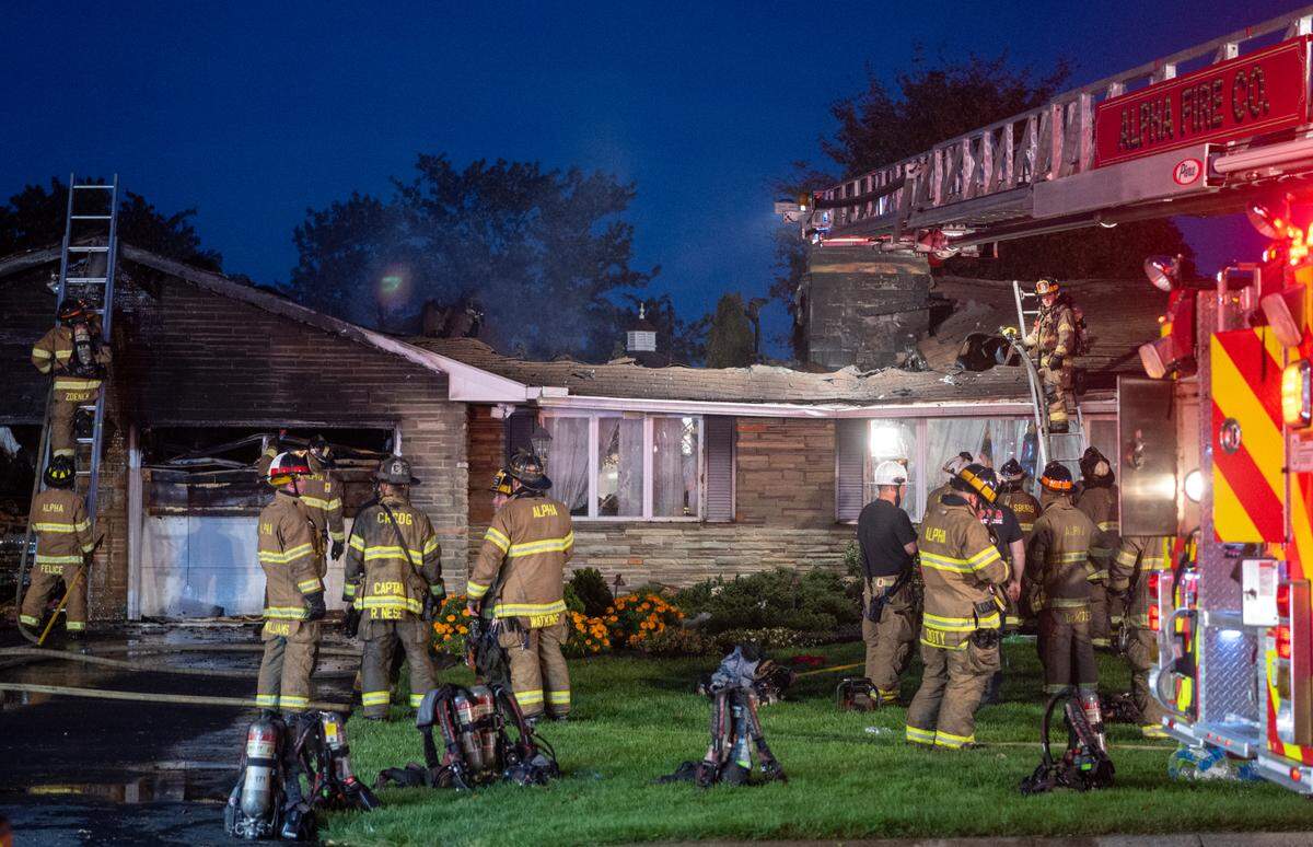 Centre County fire crews work on the scene of a house fire in the 900 block of Oak Ridge Avenue in College Township on Thursday, Sept. 21, 2023.
