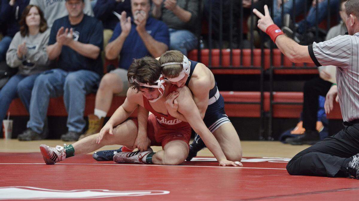 Penn State’s Devin Schnupp scores a takedown on Indiana’s Liam Cronin in their 125-pound bout of the Nittany Lions’ 35-9 win on Sunday, January 27, 2019. Schnupp beat Cronin 5-2, for his first Big Ten dual victory.