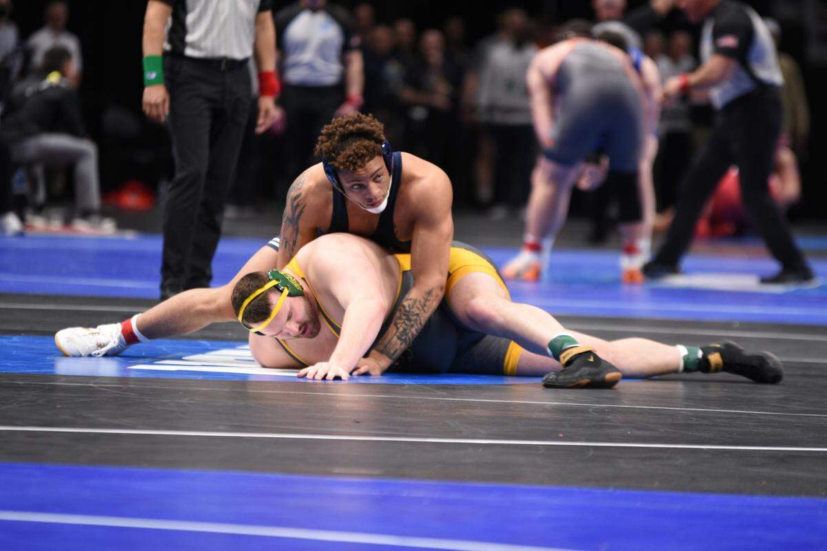 Penn State’s Greg Kerkvliet controls North Dakota State’s Brandon Metz in their 285-pound first round bout of the NCAA Championships on Thursday, March 17, 2022 at Little Caesar’s Arena in Detroit. Kerkvliet pinned Metz in 4:17.