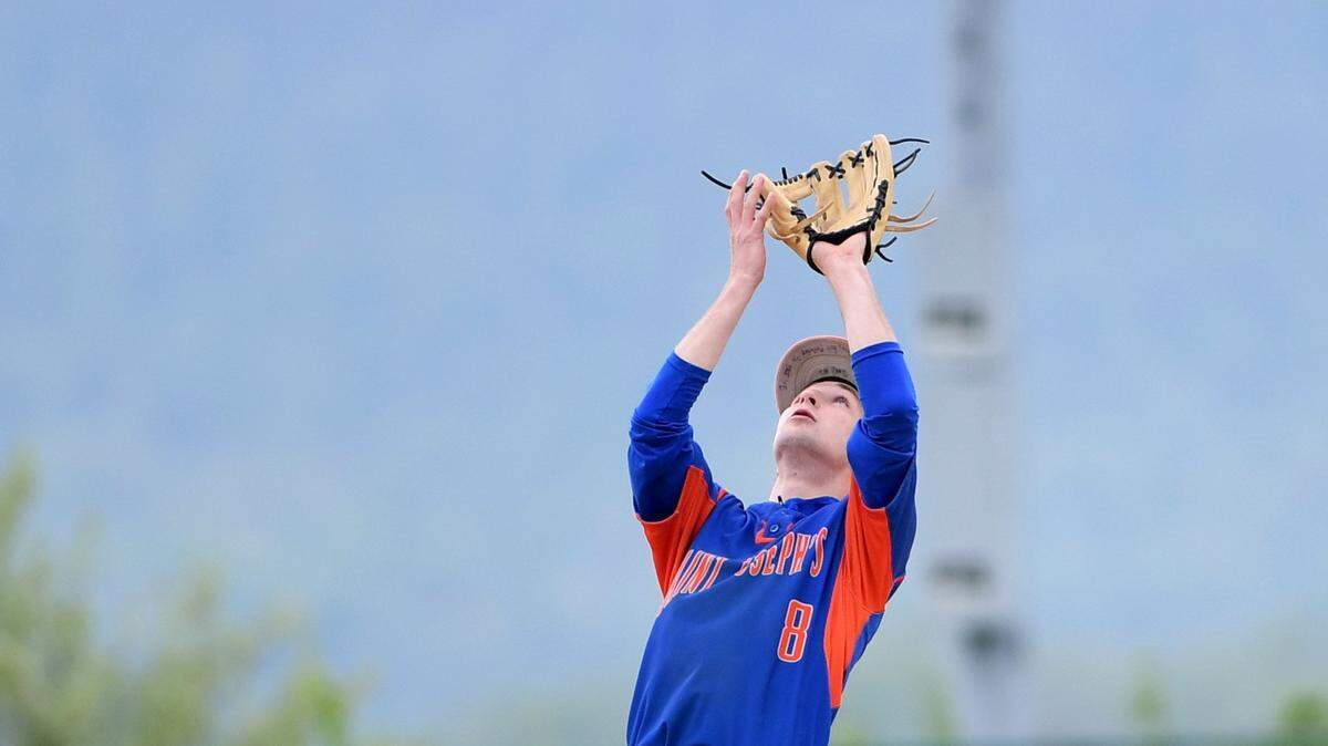 St. Joseph’s Catholic Academy’s Jack Mangene, seen here last season, was solid on the mound for Wolves in relief Wednesday. But SJCA still couldn’t hold on in a 4-3 loss to Bishop McCort in the District 6 Class A Baseball Championship at PNG Field in Altoona.