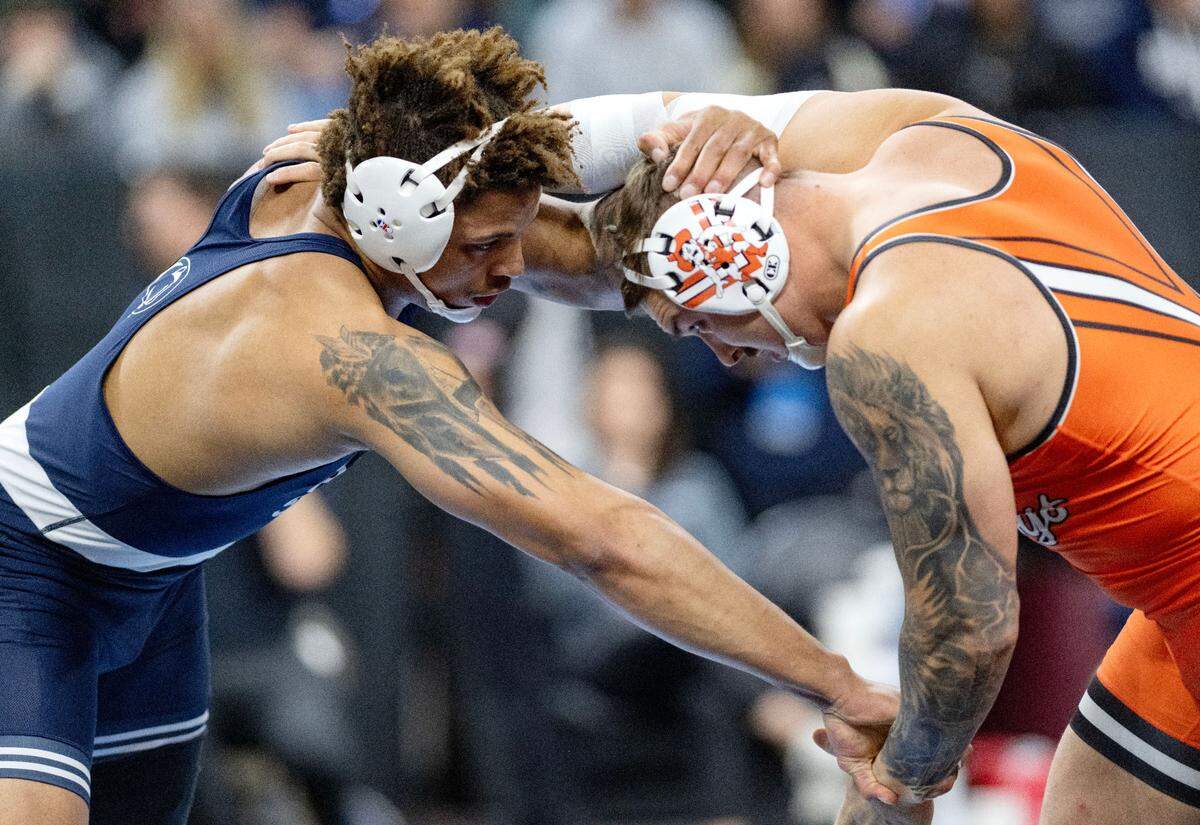 Penn State’s Greg Kerkvliet wrestles Wyatt Hendrickson in a 285-pound semifinal bout at the 2025 NCAA Wrestling Championships in Philadelphia on Friday, March 21, 2025.