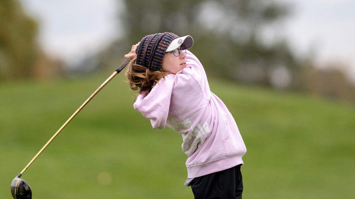 Saint Joseph’s Catholic Academy’s Maddie Koshko tees off during the PIAA golf championships on Tuesday at the Penn State Golf Courses.