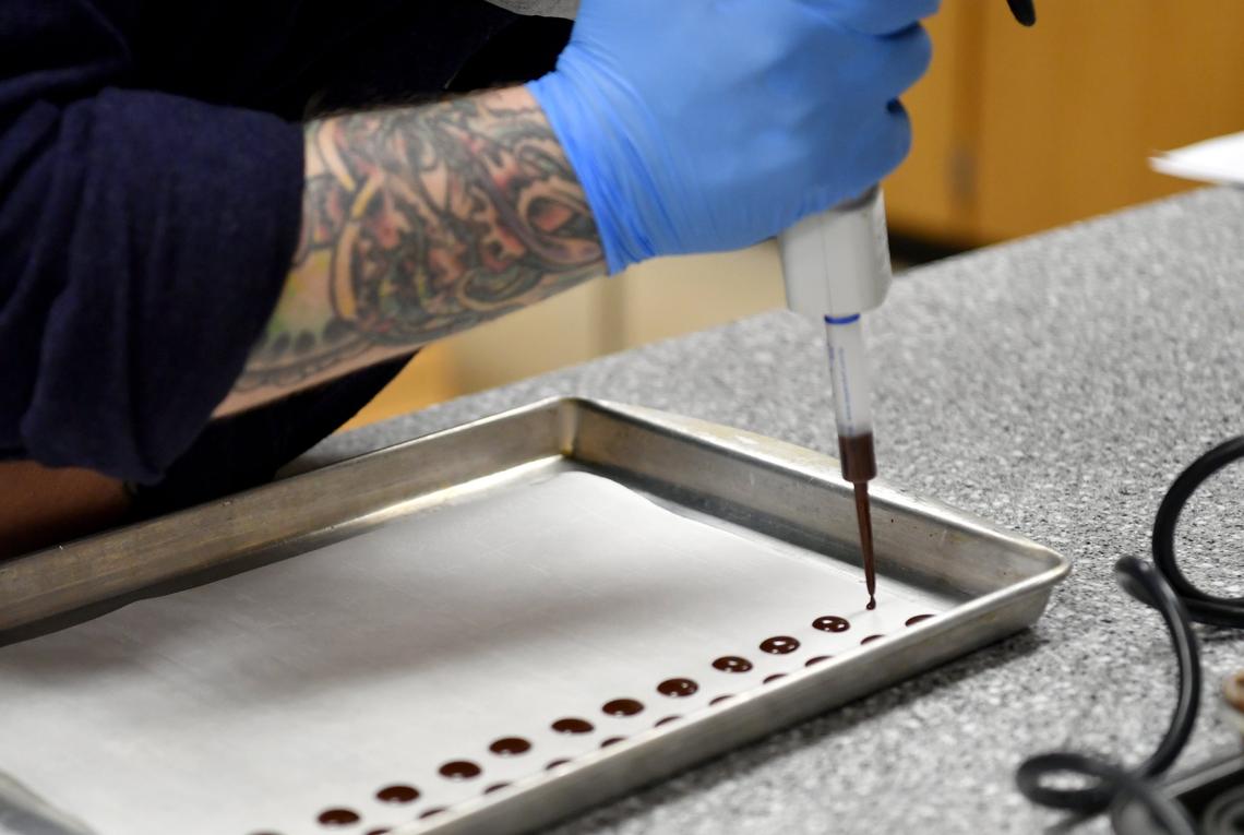 Visiting doctoral student and chocolate maker Alan McClure prepares for chocolate for a study in the Penn State’s Sensory Evaluation Center on Nov. 1.