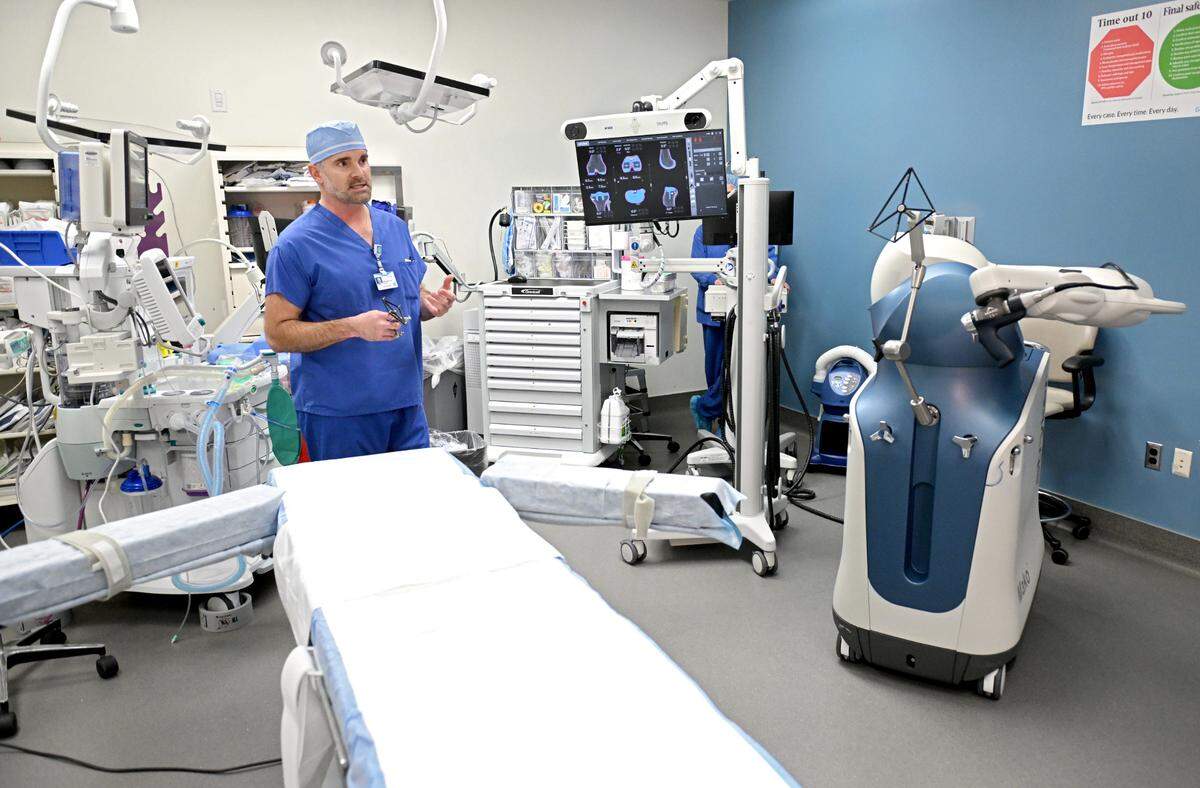 Orthopedic surgeon Dr. Michael Sobolewski talks about the Mako robotic arm that is used to help with precision for joint replacement surgeries at Geisinger Healthplex State College on Wednesday, Jan. 29, 2025.