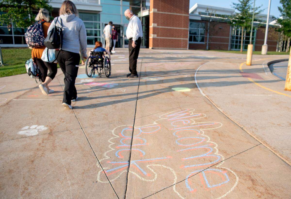Sidewalk chalk welcomes students to the first day of school at Mount Nittany Elementary on Tuesday.