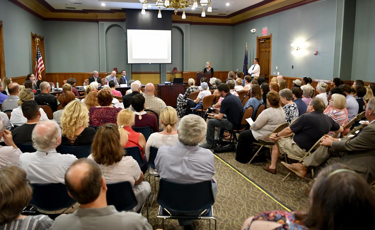 Kellie Wayda from the Pennsylvania Department of Human Services Offices of Mental Health and Substance Abuse Service speaks to the full room at the board of commissioners community conversation about mental health services in Centre County on June 27.