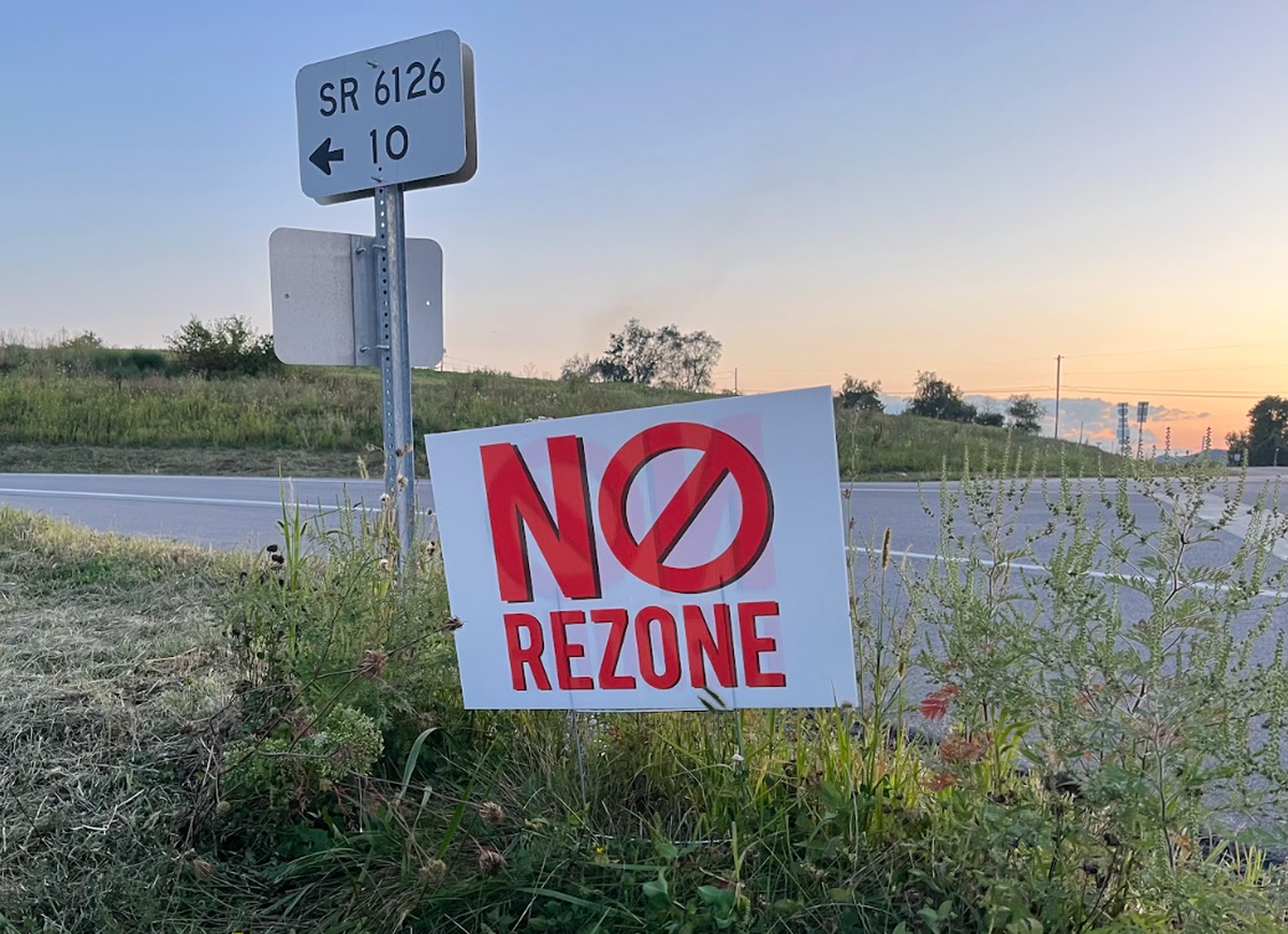 A “NO REZONE” sign is pictured at the intersection of Walt Road and and Jacksonville Road in early September.