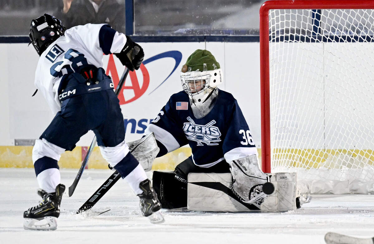 Eli Elkin blocks a shot from Kanray Lei as the Icers 12U team plays on the ice at Beaver Stadium on Wednesday, Jan. 28, 2026.