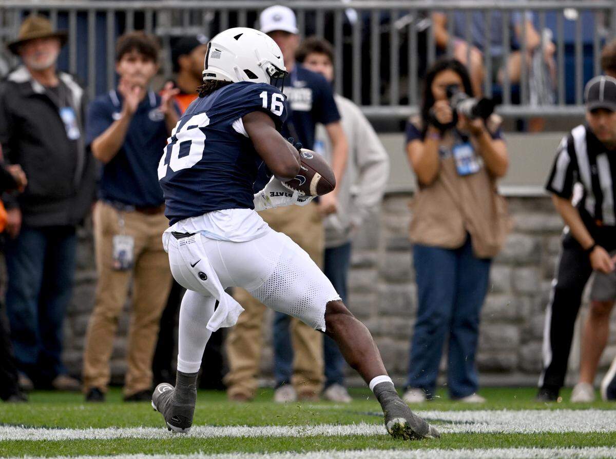 Penn State cornerback Elliot Washington II makes a catch in the endzone for a touchdown during the game against Indiana on Saturday, Oct. 28, 2023.