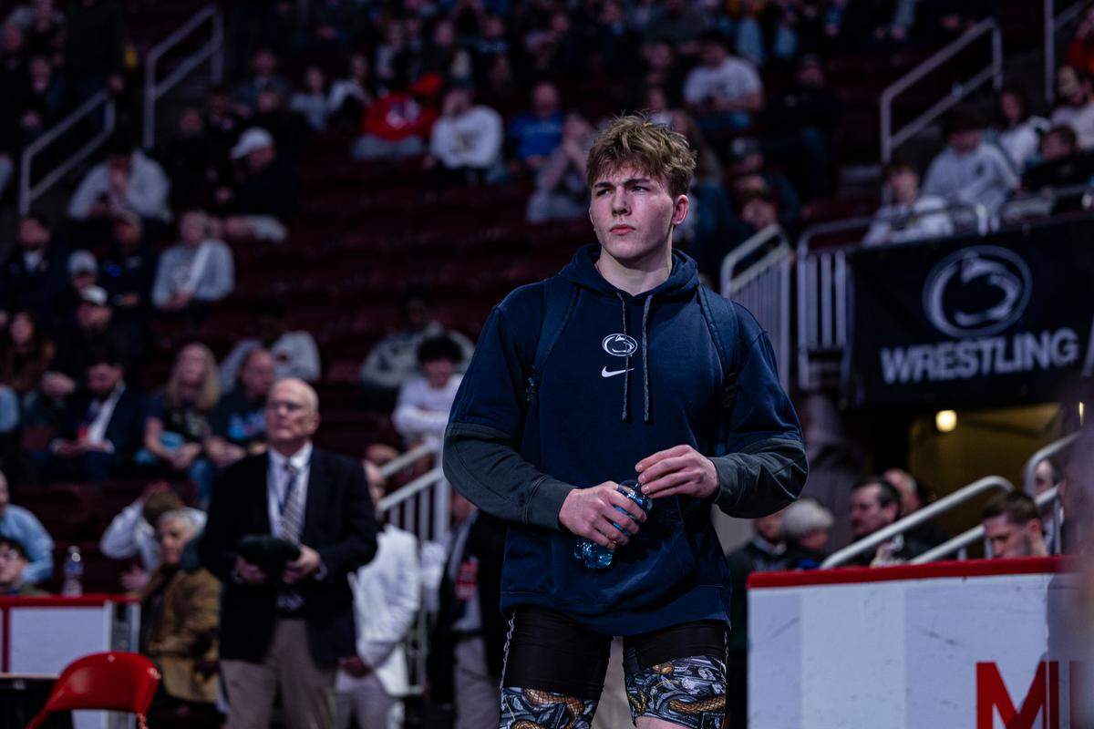 State College senior Asher Cunningham, a Penn State commit, readies himself Saturday right before the Class 3A state title match at 172 pounds, where he won by a 12-6 decision against Thomas Jefferson’s Bode Marlow at Hershey’s Giant Center.