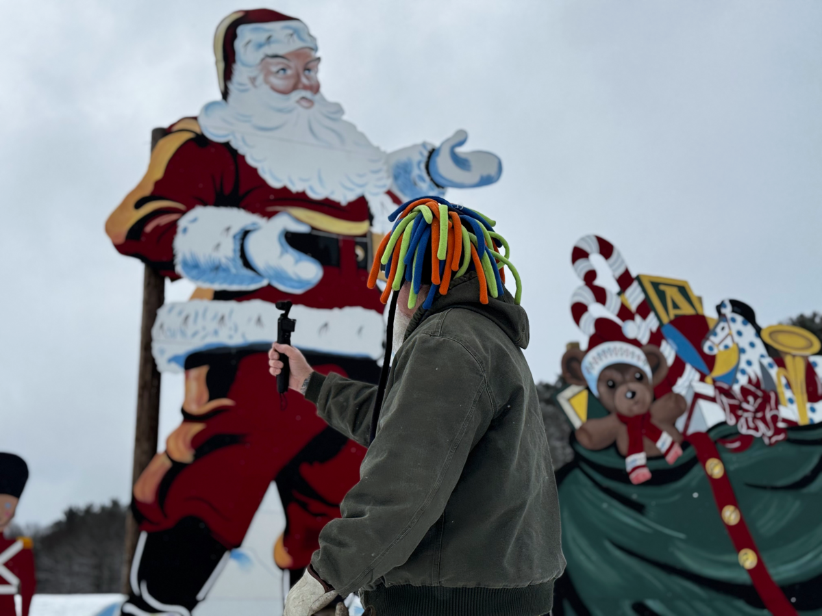 Jeff Hopkins films Philipsburg’s big Santa for his YouTube channel, Wild West Hopkins Family, on Dec. 2, 2025.