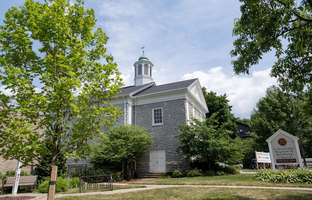 A new maple tree was planted outside of University Baptist and Brethren Church as part of their 100 year anniversary celebration. The church also is planting trees at Walnut Springs Park and donating to the Million Tree Campaign.