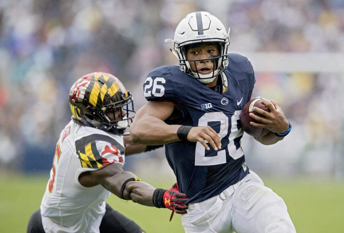Penn State running back Saquon Barkley avoids the tackle from Maryland defensive end Melvin Keihn to run into the end zone, but the touchdown was called back due to a penalty during the Saturday, Oct. 8, 2016 game at Beaver Stadium. Penn State won, 38-14. 