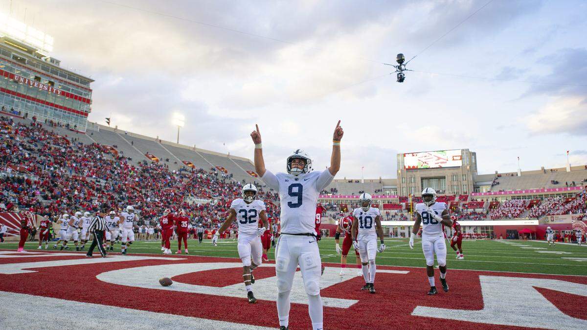 Penn State quarterback Trace McSorley (9) reacts in the end zone after scoring during the second half of Saturday’s game. Penn State won 33-28. (AP Photo/Doug McSchooler)