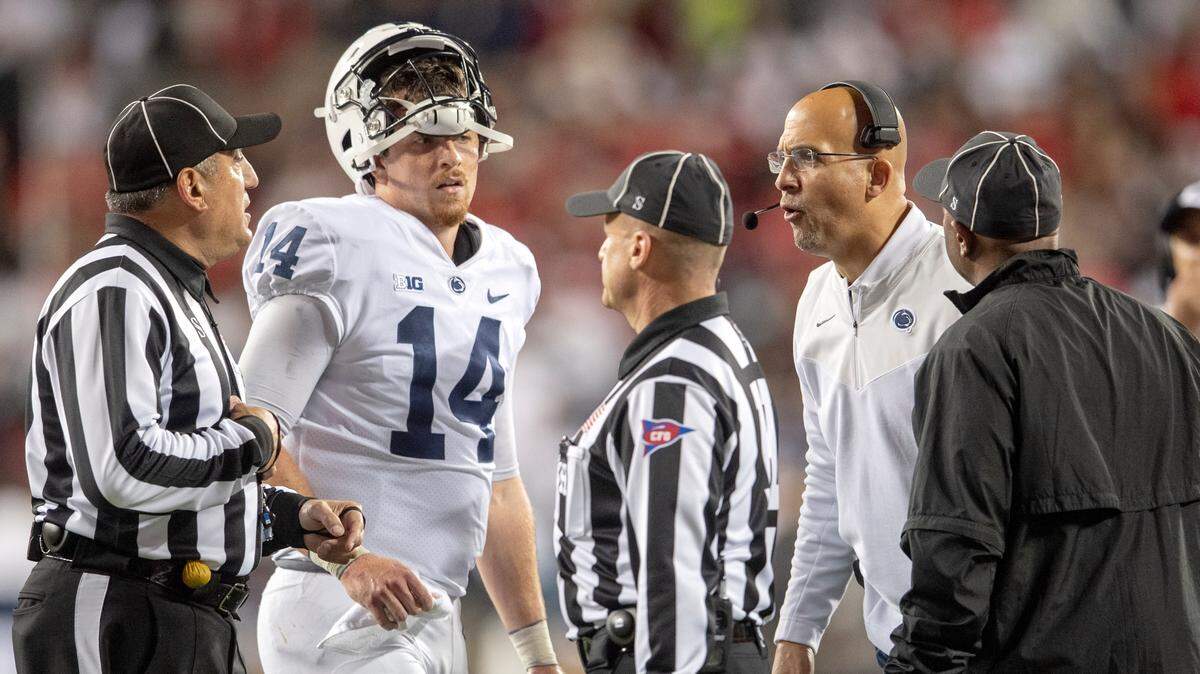 Penn State quarterback Sean Clifford and coach James Franklin look to the refs for a call during the game against Ohio State on Saturday, Oct. 30, 2021 at Ohio Stadium.