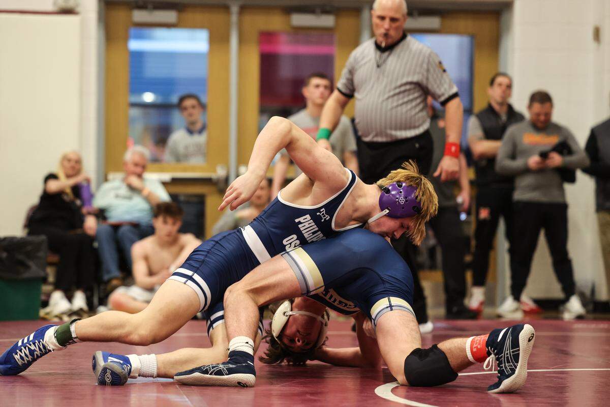 Philipsburg-Osceola’s Averi Gable scrambles with McGuffey’s Emmett Wolfe in their 145-pounds second round match of the PIAA Class 2A Southwest Regional Championships on Friday, Feb. 27, 2026 in Altoona. Gable edged Wolfe, 8-5.
