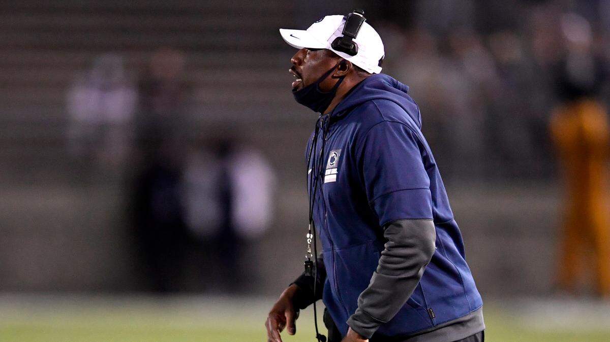 Penn State defensive line coach John Scott Jr. yells to his players during Penn State football practice on Friday, April 23, 2021 at Beaver Stadium.