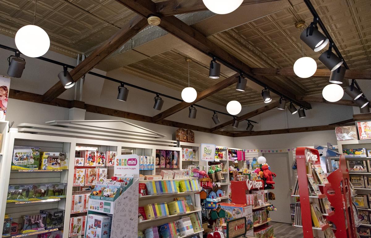 Growing Tree Toys did some interior redesign, like updating the old tin roof and floors.