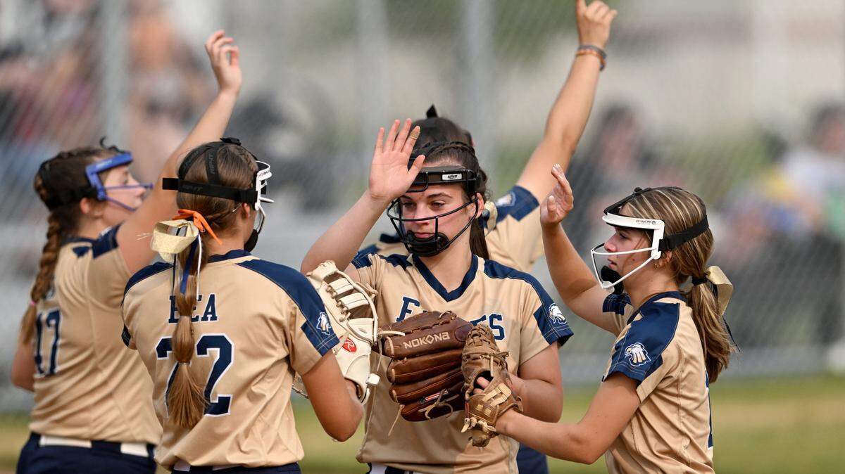 Bald Eagle Area’s Sierra Albright high-fives the infielders after a strikeout during the game against Muncy in the first round of the PIAA class 2A softball playoffs on Monday, June 5, 2023.