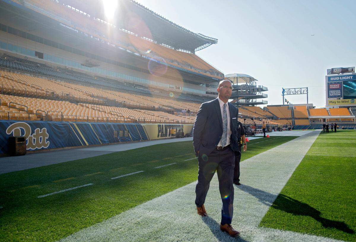 Penn State football coach James Franklin walks the perimeter of Heinz Field when the team arrived at the stadium for the Sept. 10, 2016 game against Pitt.