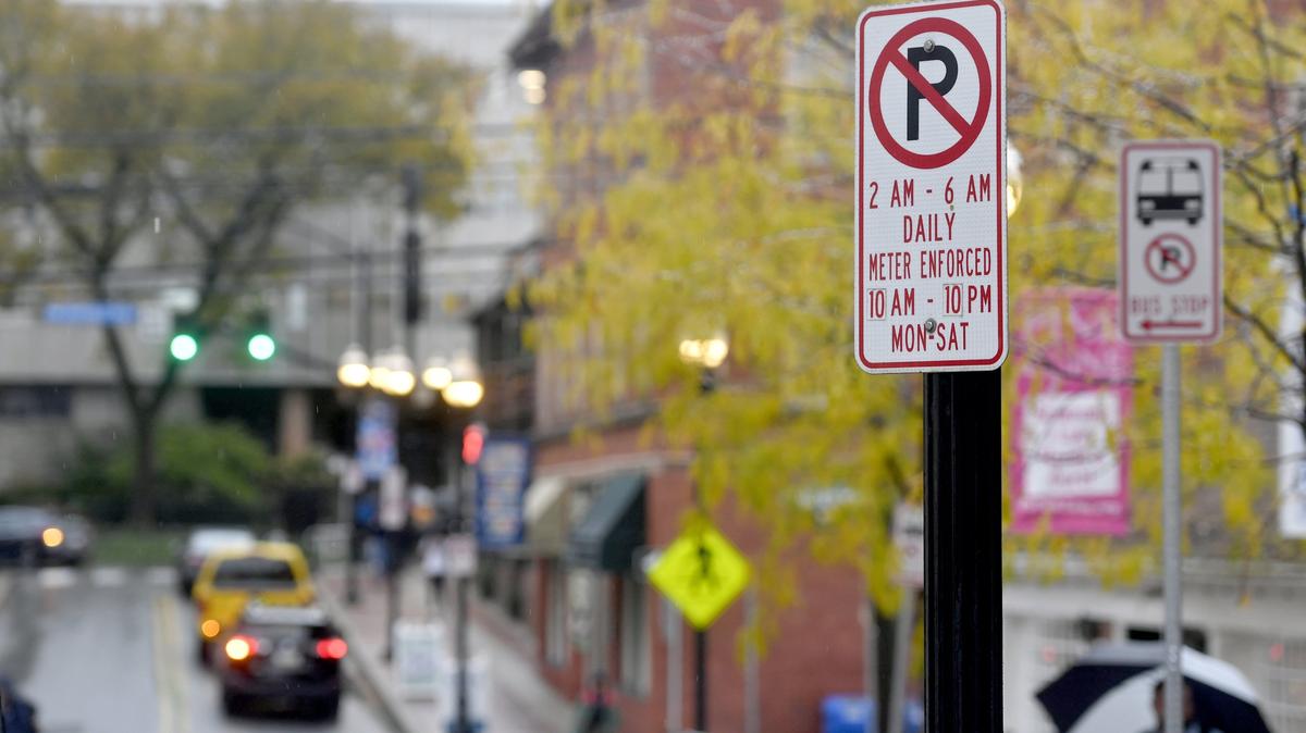 A parking enforcement sign on Fraser Street in downtown State College on Tuesday, Oct. 22, 2019.