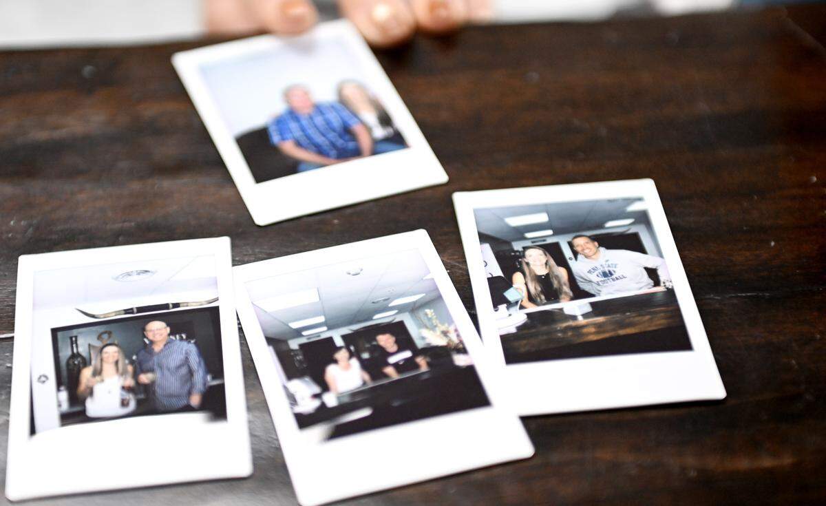 Polaroids with customers and friends at the Whiskey Barber Salon on Thursday, April 30, 2026.  