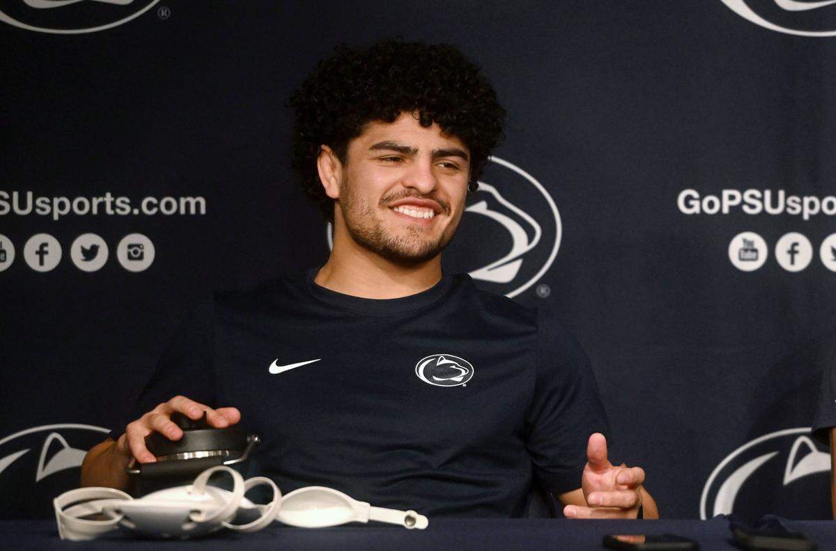 Penn State wrestler Beau Bartlett laughs as he answers questions about the upcoming season during media day on Monday, Nov. 11, 2024.