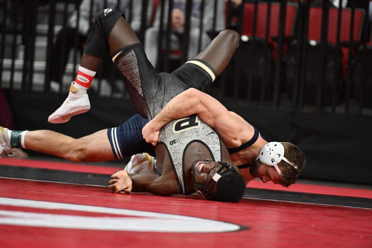 Penn State’s Brady Berge looks to pin Purdue’s Kendall Coleman in their 157-pound consolation semifinals bout of the Big Ten Championships on Sunday, March 6, 2022 in Lincoln, Neb. Berge did pin Coleman in 2:59.