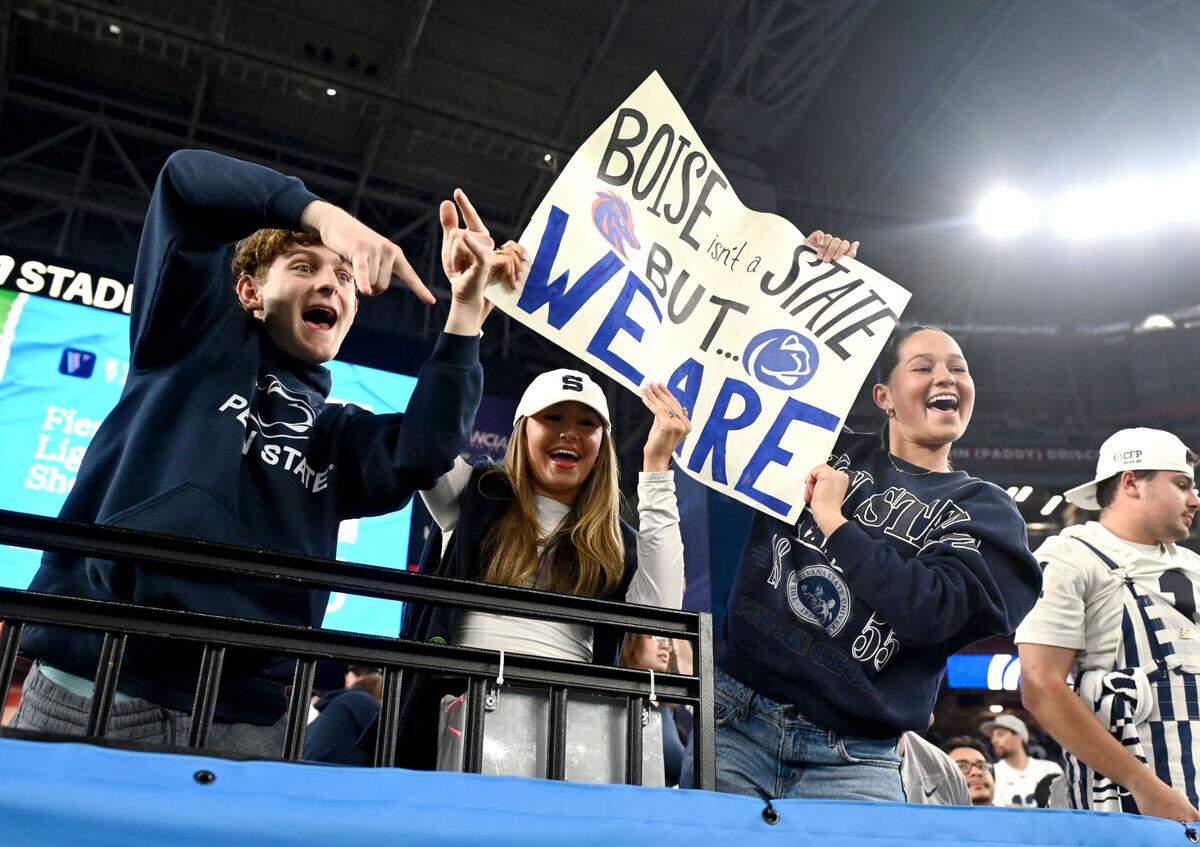 Penn State fans hold a sign during the Fiesta Bowl against Boise State on Tuesday, Dec. 31, 2024 at State Farm Stadium.