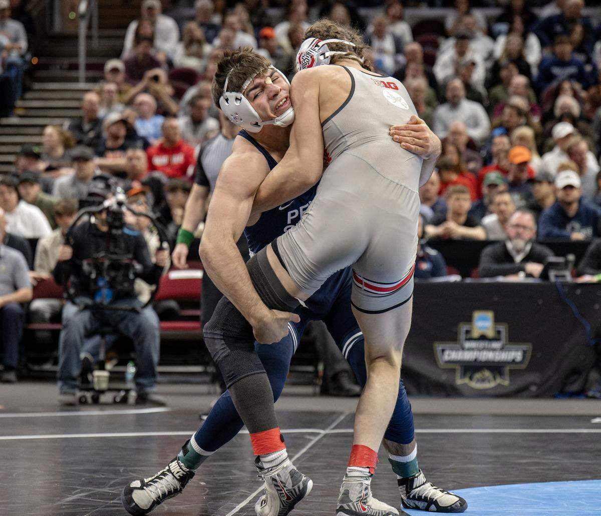 Penn State's PJ Duke controls Ohio State's Brandon Cannon in the 157-pound bronze medal match at the NCAA wrestling championships on Saturday, March 21, 2026. Duke won by tech fall 20-4 at 6:37.
