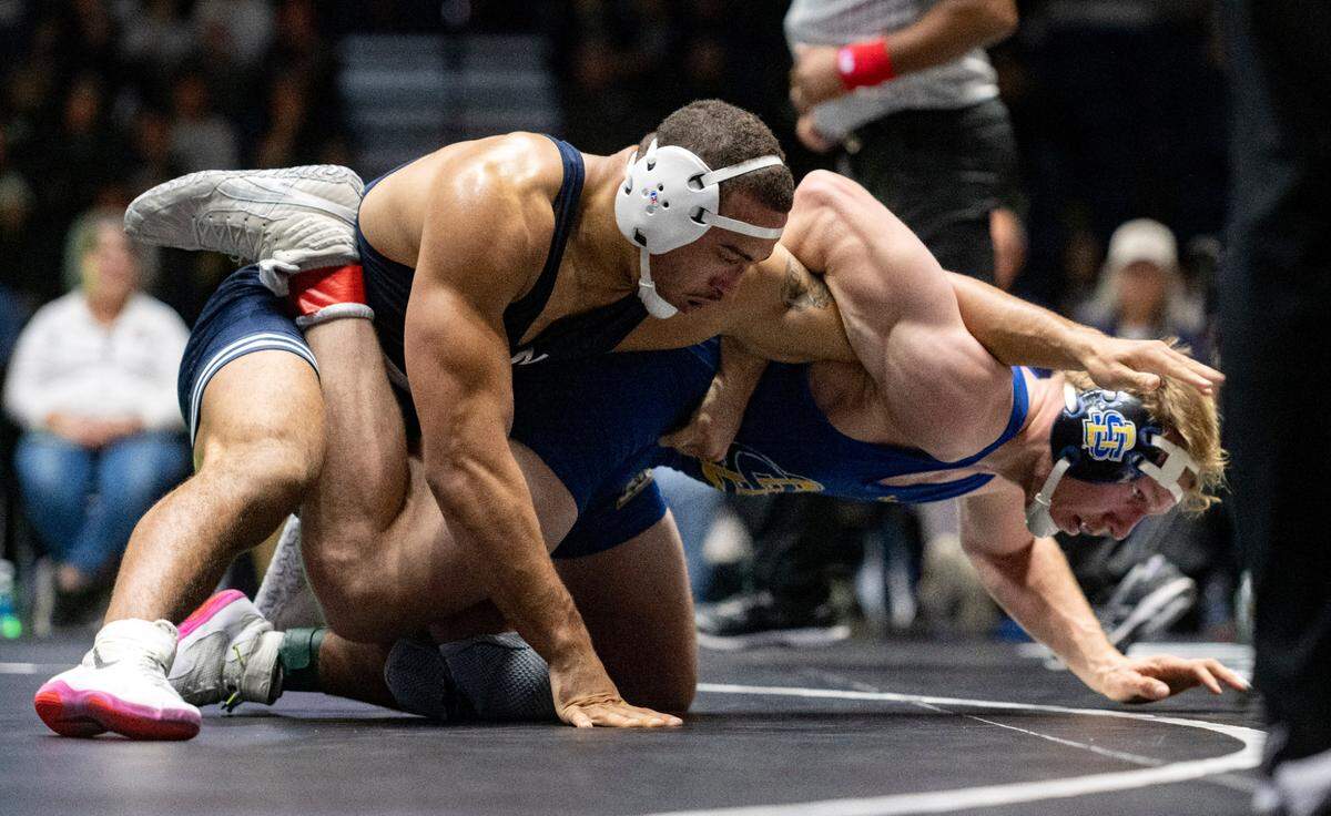 Penn State’s Aaron Brooks controls South Dakota’s Tanner Sloan in the 197 lb bout of the National Wrestling Coaches Association All-Star Classic at Rec Hall on Tuesday, Nov. 21, 2023.