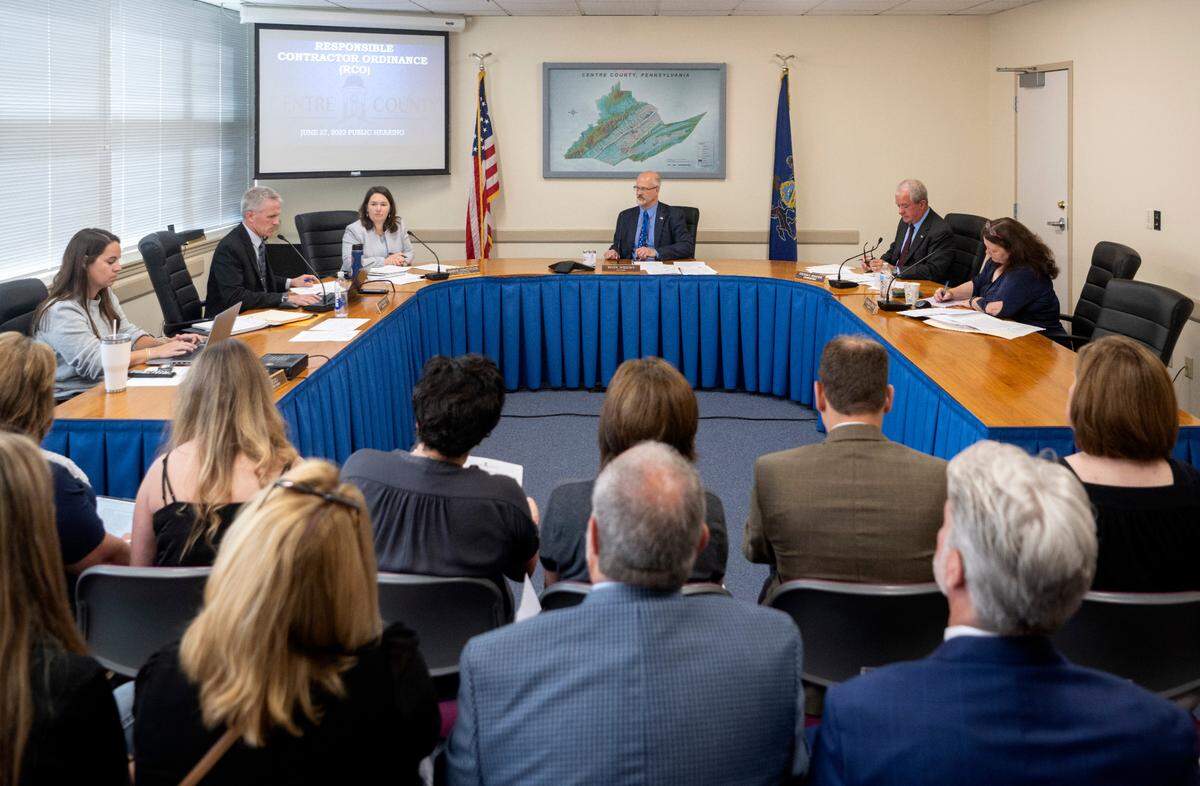 Centre County county administrator John Franek reviews the Responsible Contractor Ordinance to a crowded room before public comment of the Centre County Board of Commissioners meeting on Tuesday, June 27, 2023 at the Willowbank building.
