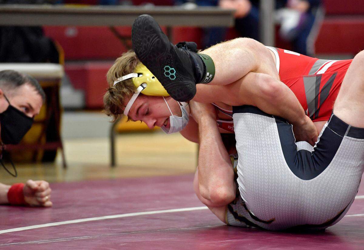 Bellefonte’s Ethan Richner controls Hollidaysburg’s Campbell Walls in the 160 lb championship bout at the District 6 3A tournament on Friday, Feb. 19, 2021 at Altoona High School.