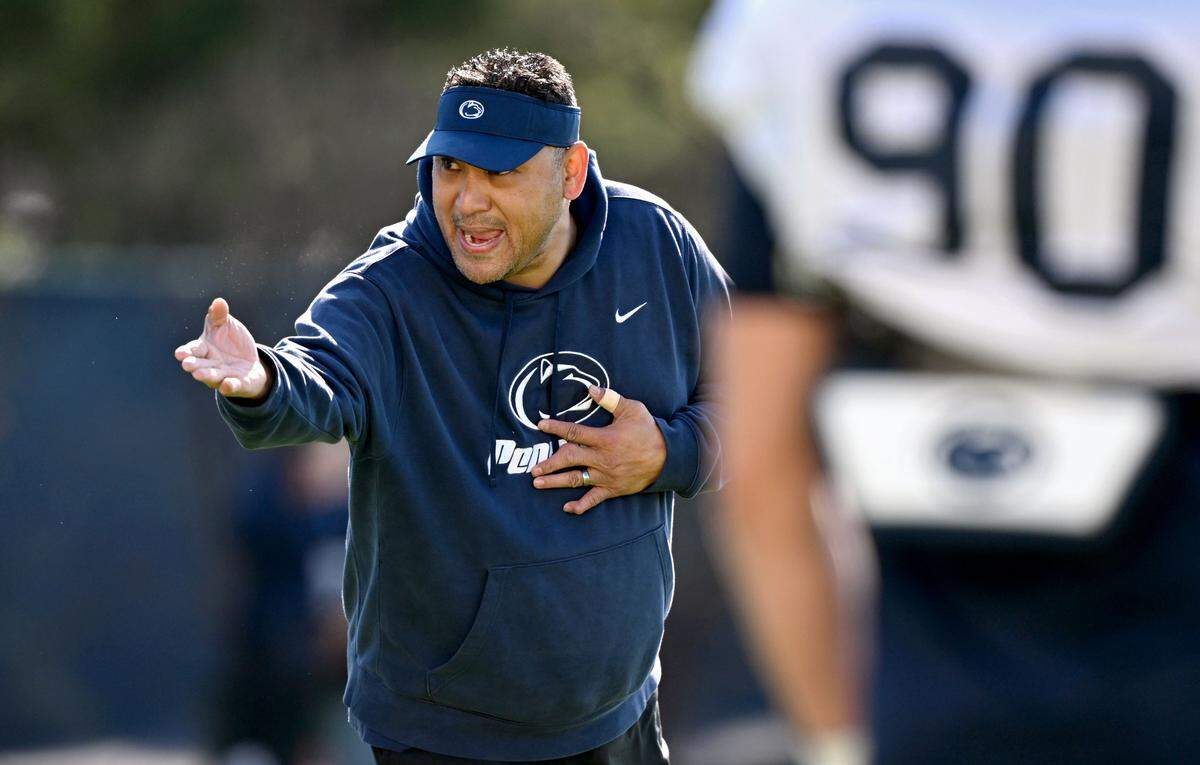 Penn State defensive line coach Ikaika Malloe yells to players during practice on Thursday, April 9, 2026.  
