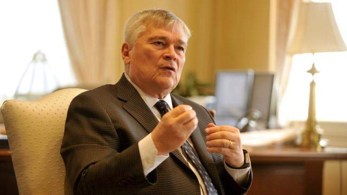 Penn State President Eric Barron talks during an interview with the Centre Daily Times in his office at Old Main on Tuesday, Jan. 27, 2015.
