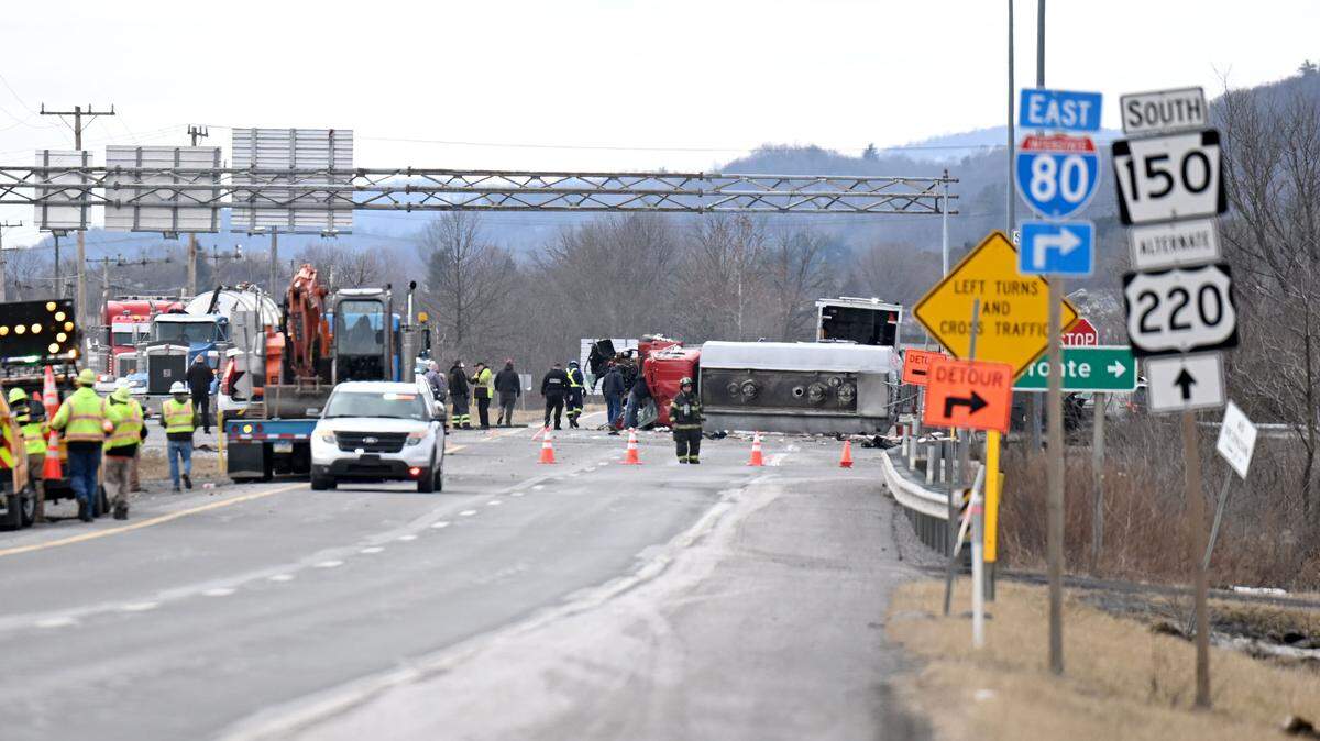 Emergency crews work at the scene of a crash Thursday, Feb. 26, 2026 near the intersection of an Interstate 80 eastbound exit ramp and North Eagle Valley Road in Boggs Township.