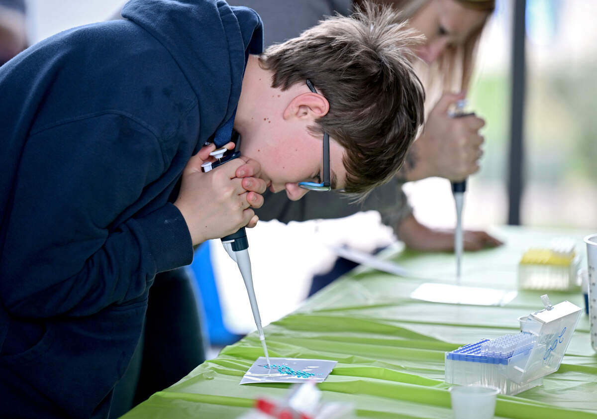 Trevor Stevens, 12, uses a pipette to make art during and activity at the One Health Microbiome Center at Penn State’s Bring Our Children to Work Day on Monday, April 13, 2026.