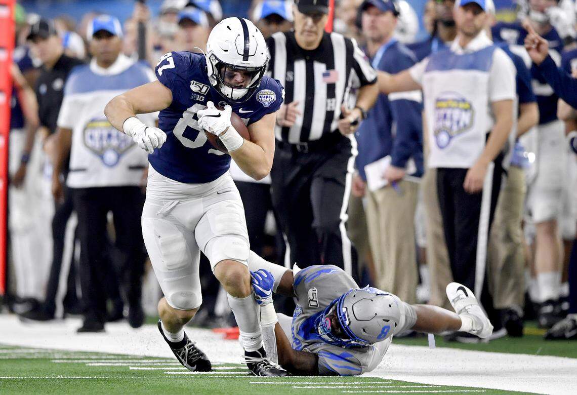Memphis linebacker Xavier Zay Cullens can’t stop Penn State tight end Pat Freiermuth as he cuts down the field with the ball during the Cotton Bowl at AT&T Stadium in Arlington, Texas, on Saturday, Dec. 28, 2019.