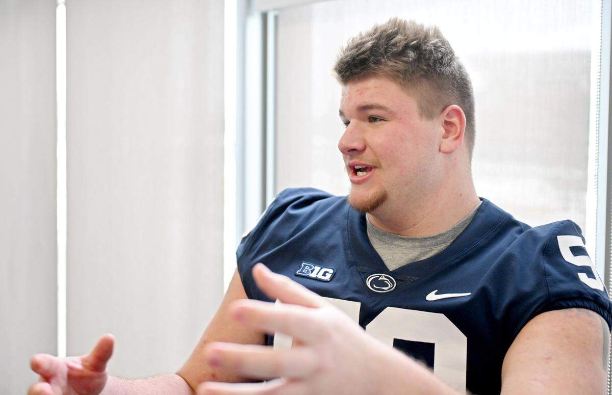 Penn State offensive lineman Cooper Cousins answers questions during a media availability on Tuesday, Feb. 11, 2025.
