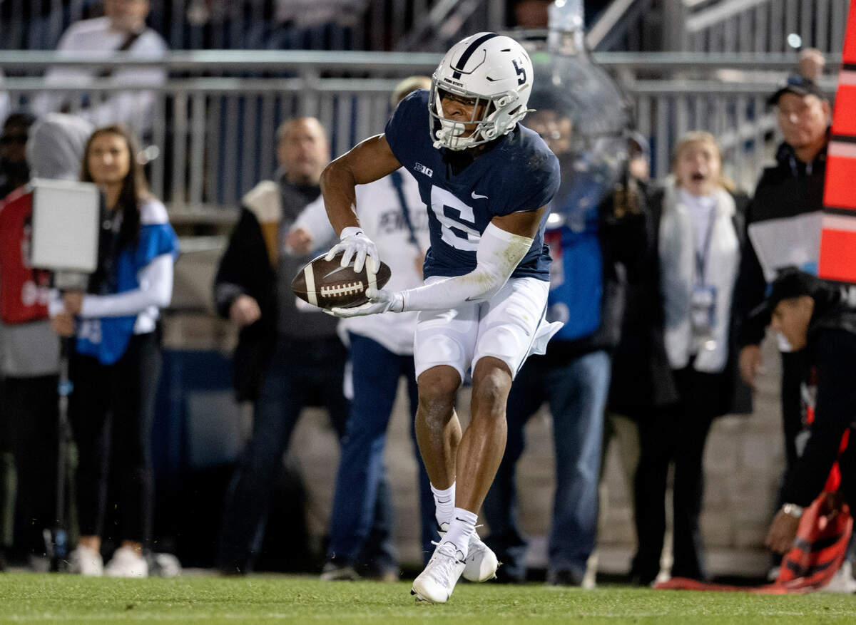 Penn State wide receiver Mitch Tinsley makes a catch and runs it in for a touchdown during the game against Minnesota on Saturday, Oct. 22, 2022.