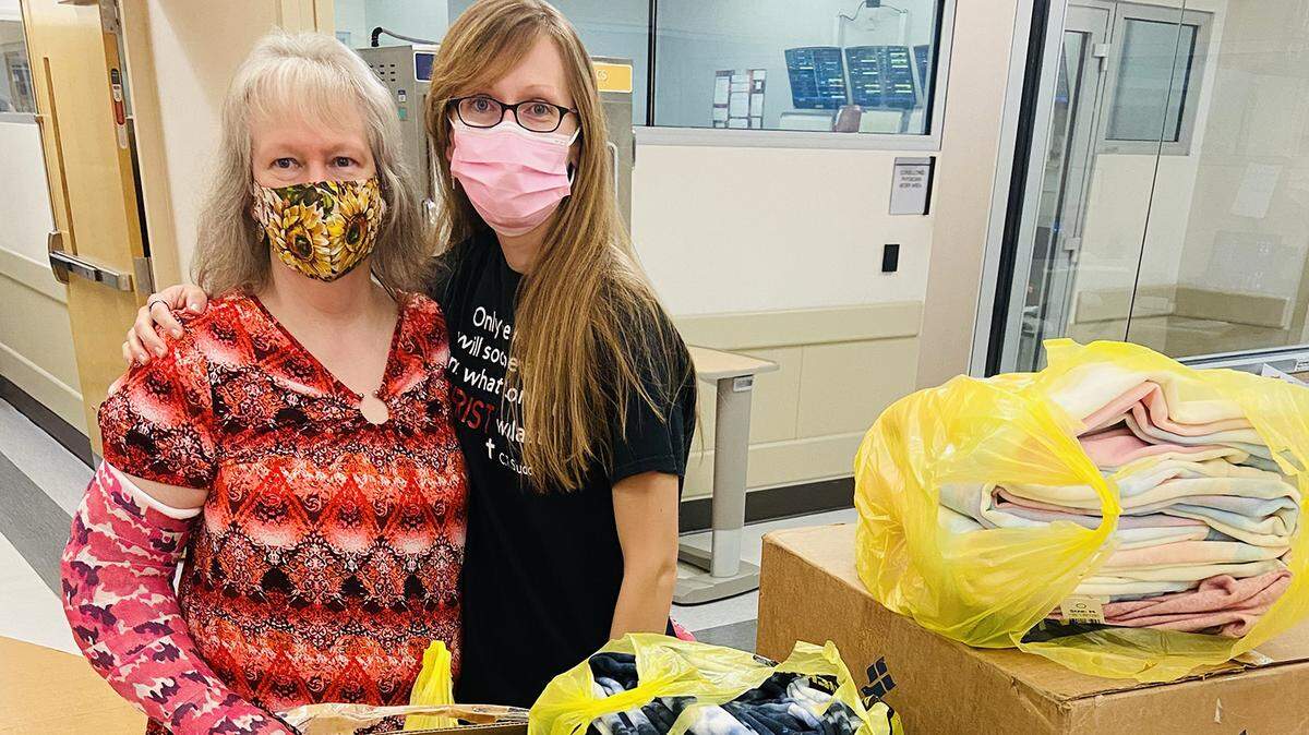 Regina Barton, left, and her daughter Jenn Traxler, right, on Oct. 21. Traxler, a registered nurse at Mount Nittany Medical Center, launched a clothing initiative earlier this year for trauma patients.