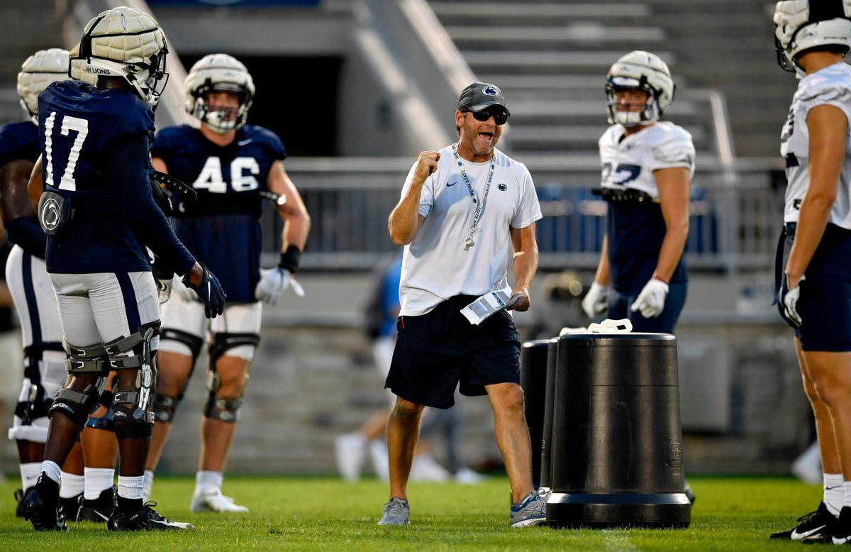 Penn State defensive coordinator Brent Pry instructs his players during practice on Wednesday, Aug. 25, 2021 in Beaver Stadium.