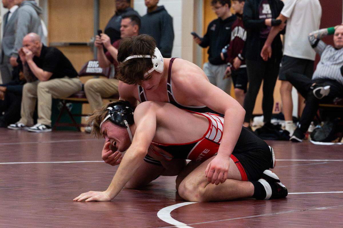 State High's Teag Sanderson, top, wrestles Bellefonte's Jack McHail during the District 6 Class 3A individual championships in the Altoona High School Fieldhouse in Altoona, Pa., on Saturday, Feb. 21, 2026.