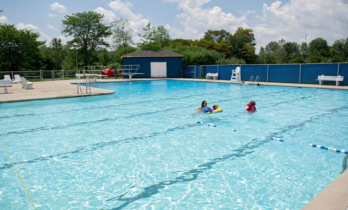 Families enjoy the water at the Mountain Top Pool on Friday, July 22, 2022.