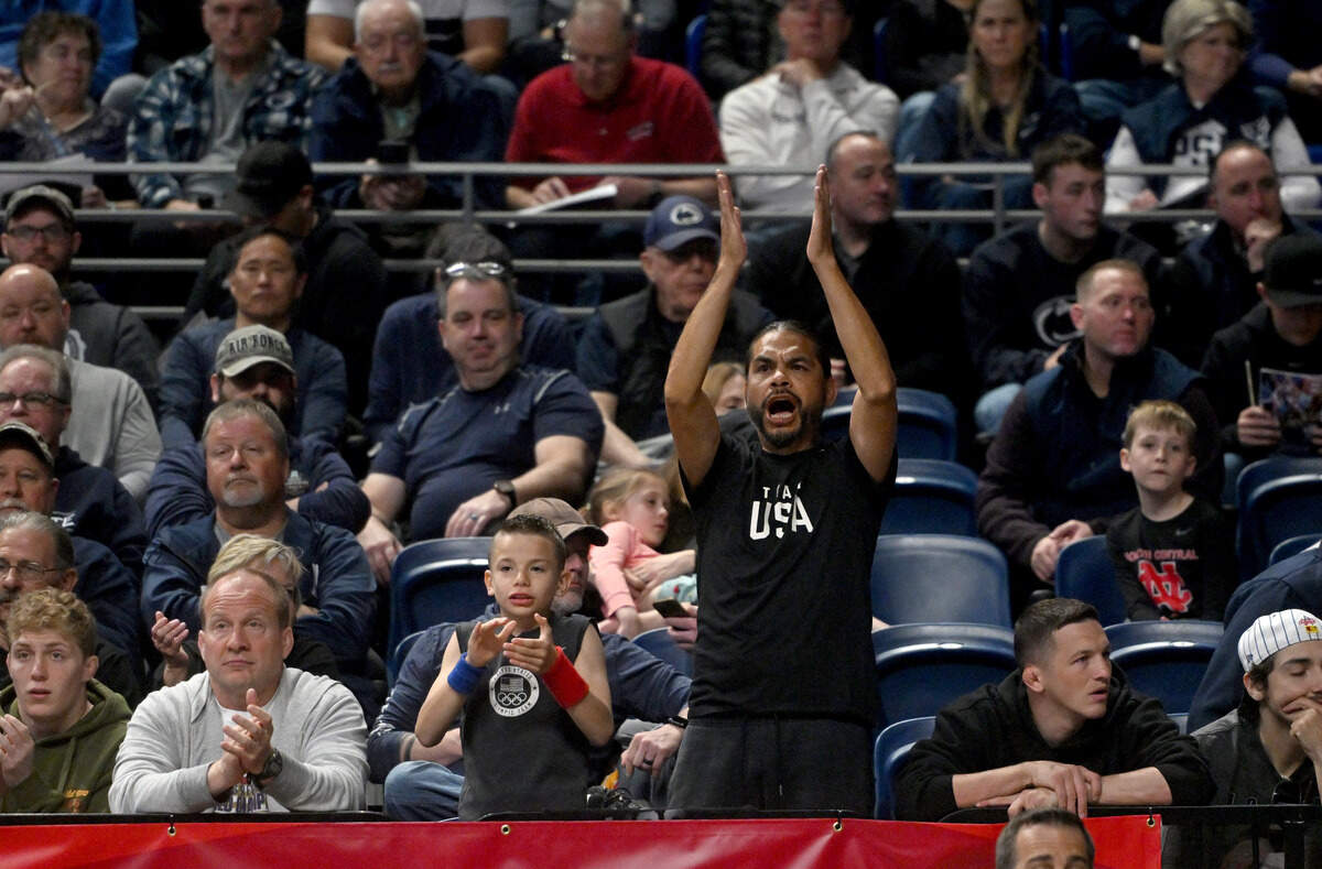 Fans cheer during the U.S. Olympic Team Trials for wrestling at the Bryce Jordan Center on Friday, April 19, 2024.