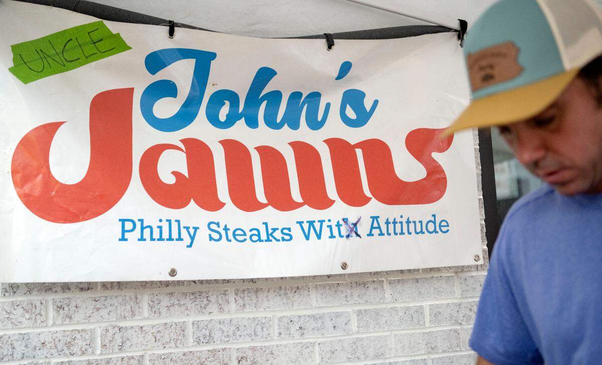John Schaffer cooks cheesesteaks at Uncle John’s Jawns outside of Angtifragile Brewing Co. on Friday, Sept. 22, 2023.