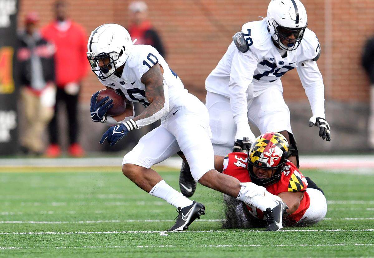 Penn State running back John Lovett cuts down the field from a Maryland defender during the game on Saturday, Nov. 6, 2021.