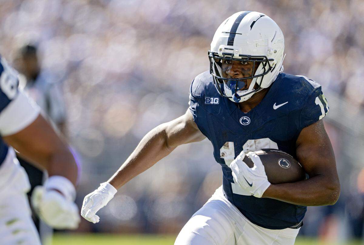 Penn State running back Nick Singleton cuts down the field with the ball during the first quarter of the game against Nevada on Saturday, Aug. 30, 2025 at Beaver Stadium.