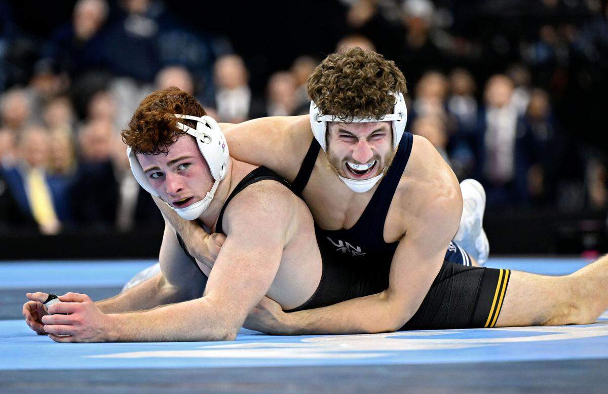 Penn State’s Mitchell Mesenbrink celebrates his win over Iowa’s Mike Caliendo in the 165-pound championship bout of the 2025 NCAA Wrestling Championships at the Wells Fargo Center in Philadelphia on Saturday March 22, 2025.