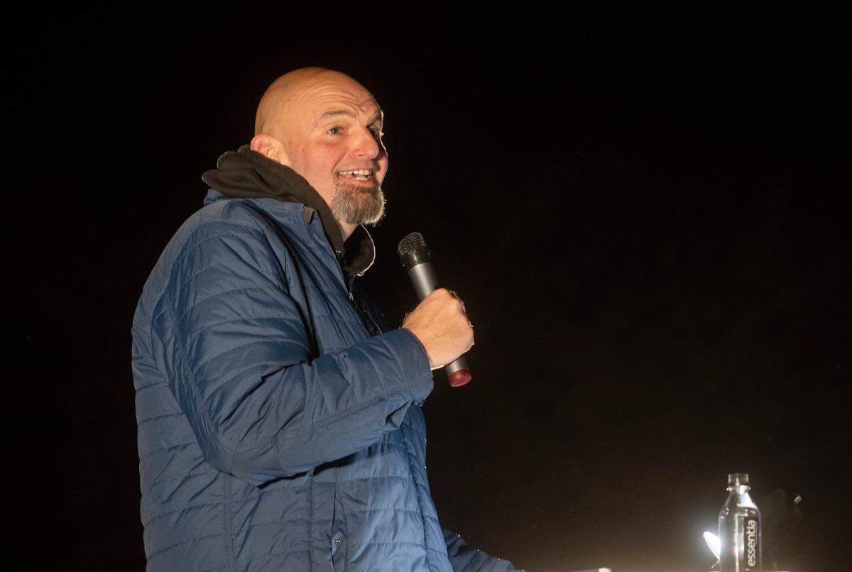 Lt. Gov. John Fetterma,n who is running for Senate, speaks during a rally outside of Old Main on Wednesday, Nov. 2, 2022.